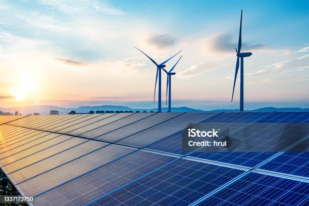 Solar And Wind Power Stock Photo - Download Image Now - Solar Panel, Wind Turbine, Solar Energy