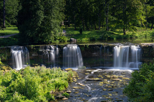 istock idyllic river landscape in the forest with a waterfall 1337176605