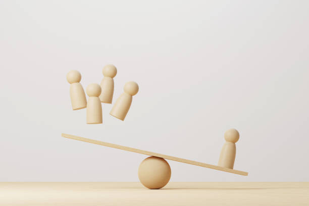 istock Wooden human compared balancing on wood scale seesaw. 3d illustration 1337176708