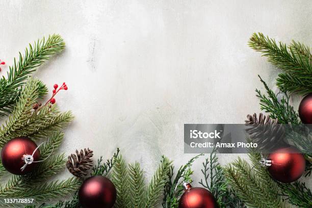 Christmas Frame With Fir Tree Branches On Light Wooden Background Stock Photo - Download Image Now