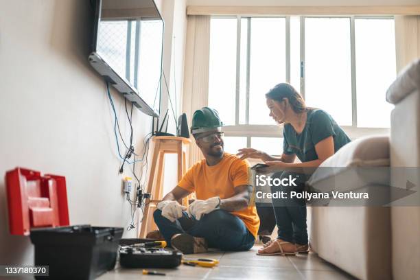 Electrician Working Home Client Stock Photo - Download Image Now - Electrician, Home Interior, Installing