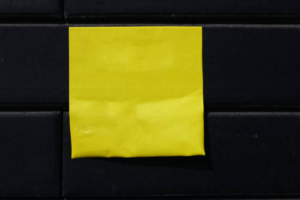 Yellow sticker or ad on the wall place for text cope space
