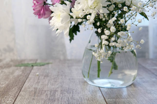 istock white chrysanthemums in a vase in a vase on the table 1337185243