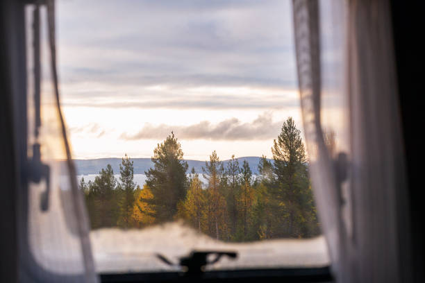 View from a window of camper to beautiful autumn landscape in Lapland, Finland View from a window of camper to beautiful autumn landscape in Lapland, Finland finnish lapland autumn stock pictures, royalty-free photos & images