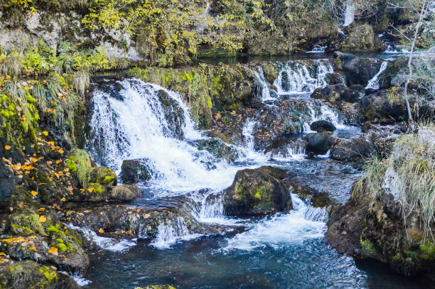 istock Mountain creek water cascades. 1337186095