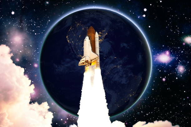 istock Rocket in space, earth in distance.Space shuttle orbiting Earth planet. The elements of this image furnished by NASA. 1337188371