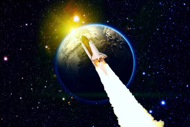 istock Space shuttle voyage through the galaxy and planets . Space shuttle orbiting Earth planet. Elements of this image furnished by NASA 1337188478
