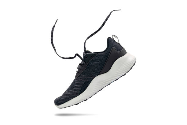 Black fashion sport shoe on white background. stock photo