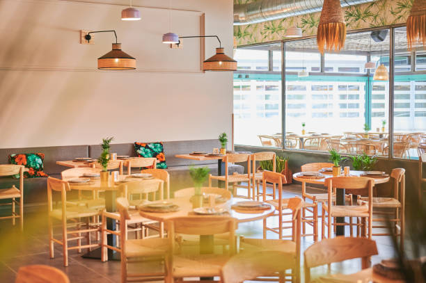 istock empty rustic design restaurant with wooden furniture with some front defocused plants 1337196378