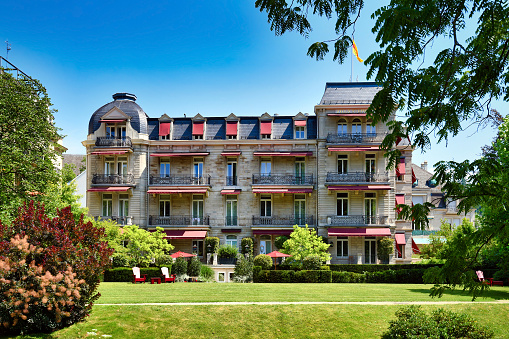 Baden-Baden, Germany - July 2021: Hotel called 'Villa Stephanie' located in public park called 'Lichtentaler Allee' in famous spa town Baden-baden on summer day