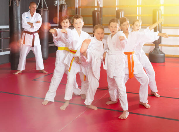 istock Group of karate kids with trainer 1337204028
