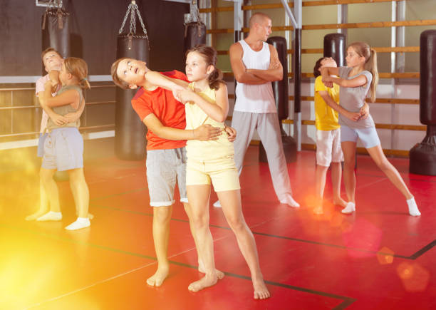 istock Children self defense training in gym 1337204294