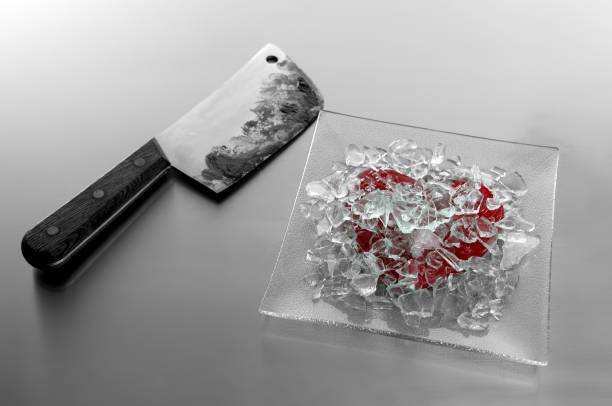 istock Broken heart with bloody knife 1337205688