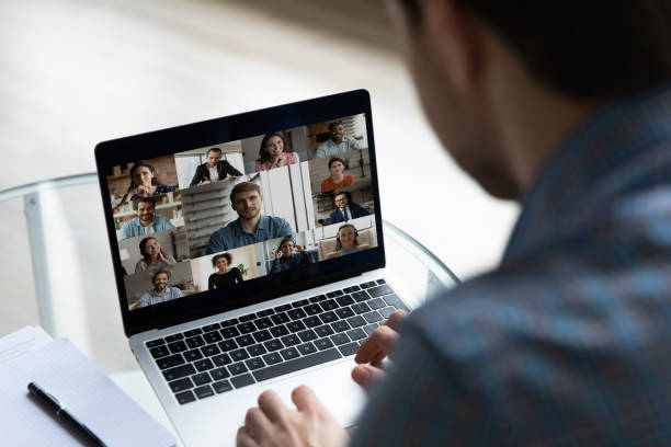 istock Laptop screen with business group video call head shots 1337206359