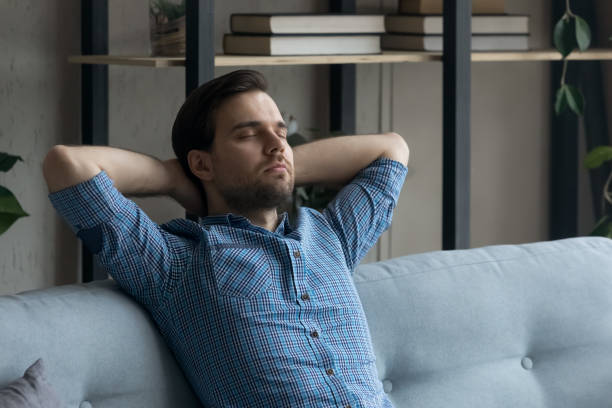 istock Calm peaceful millennial man taking break and deep breath 1337206378