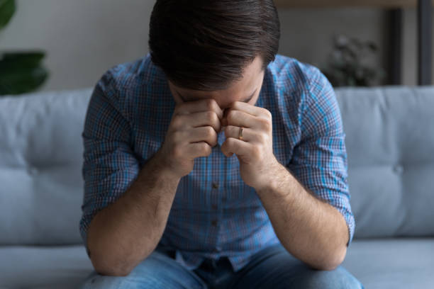istock Sad frustrated millennial man suffering from stress 1337206410