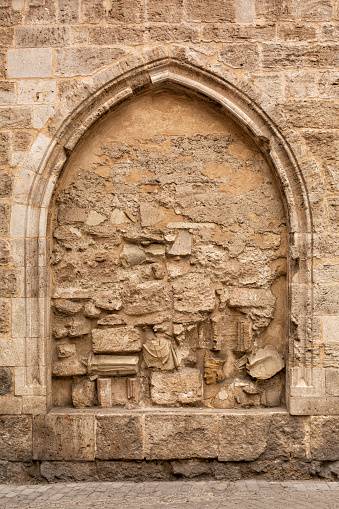 Medieval stone arch false fake window. Frame background, copy space.