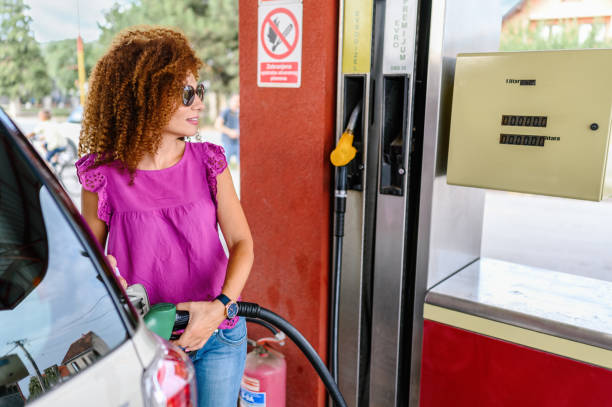 istock Young woman refuel the car 1337206802