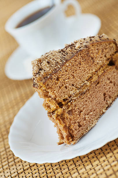 istock closeup piece cake decorated chocolate,cup coffee 133720738
