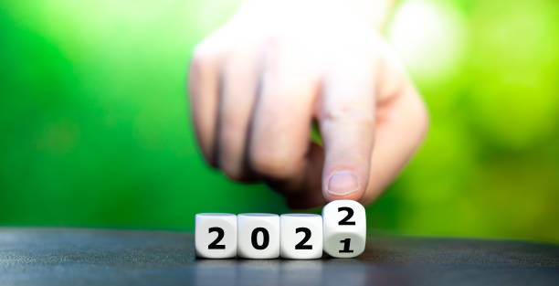 istock Hand turns a dice and changes the year 