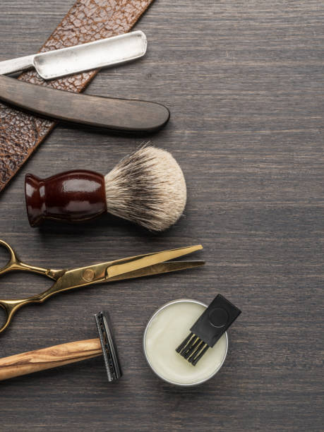 istock Classic grooming and hairdressing tools on wooden background. 1337209053
