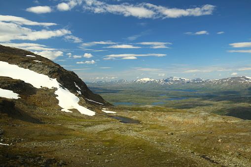 Lakes and snowy mountain in Swedish Lapland.