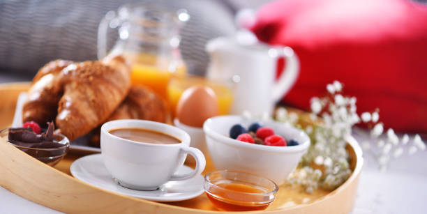 istock A tray with breakfast on a bed in a hotel room 1337210263