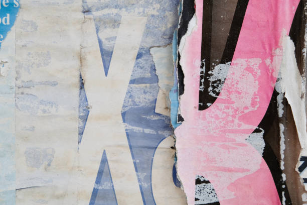istock Torn poster background. Ripped street poster texture. 1337210614