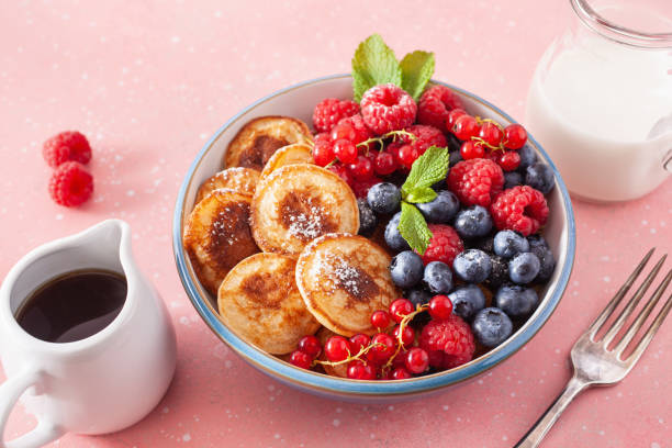 istock mini pancake breakfast bowl with berries and maple syrup 1337213209
