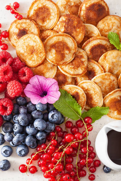 istock american mini pancake board with berries and maple syrup 1337213258