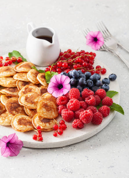 istock american mini pancake board with berries and maple syrup 1337213281