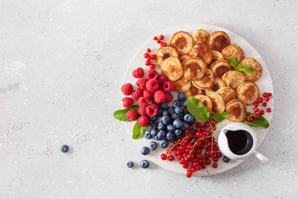 istock american mini pancake board with berries and maple syrup 1337213295