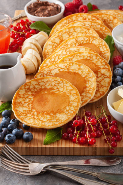 istock american pancake board with berries maple syrup butter 1337213404