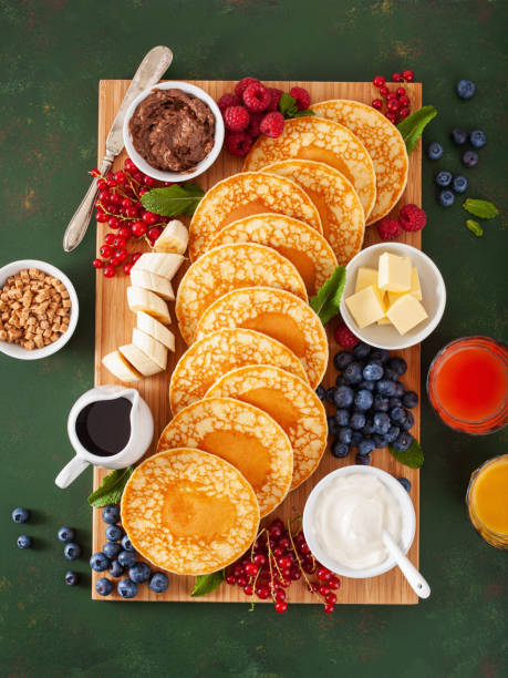 istock american pancake board with berries maple syrup butter 1337213431