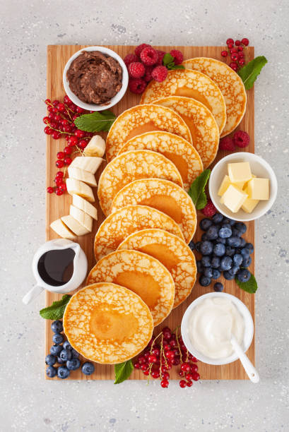 istock american pancake board with berries maple syrup butter 1337213450