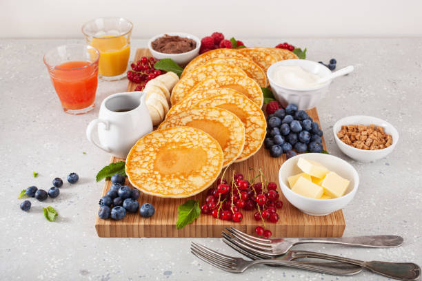 istock american pancake board with berries maple syrup butter 1337213471