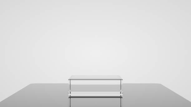 istock 3D glassy podium for packaging presentation. Product display with white plastic textures and white background. 3d illustration 1337214555