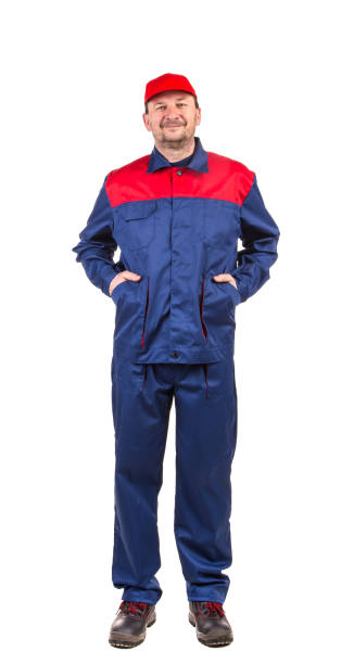 istock A worker in overalls holds his hands in his pockets. 1337216080