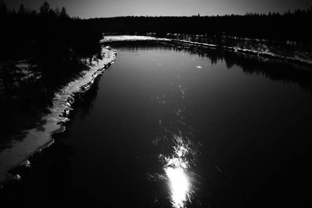Reflection of moon on Skellefte River in Swedish lapland.