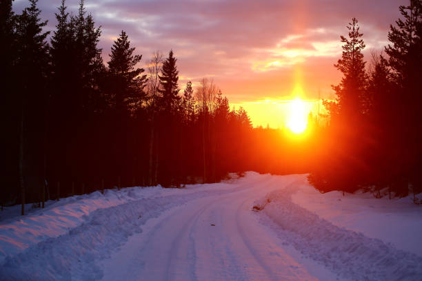 Snow covered country road in late december.