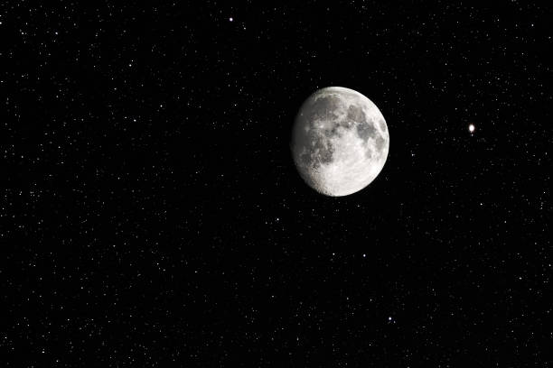 istock Waxing gibbous moon and stars on a clear sky 1337217563