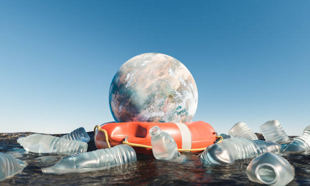 istock planet with lifebuoy in the ocean surrounded by plastic bottles 1337221026