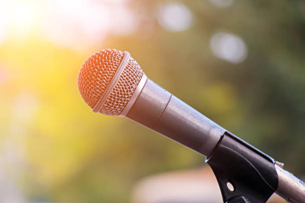 istock Microphone. Microphone on stage. Microphone close-up. Classical music. Music 1337222834