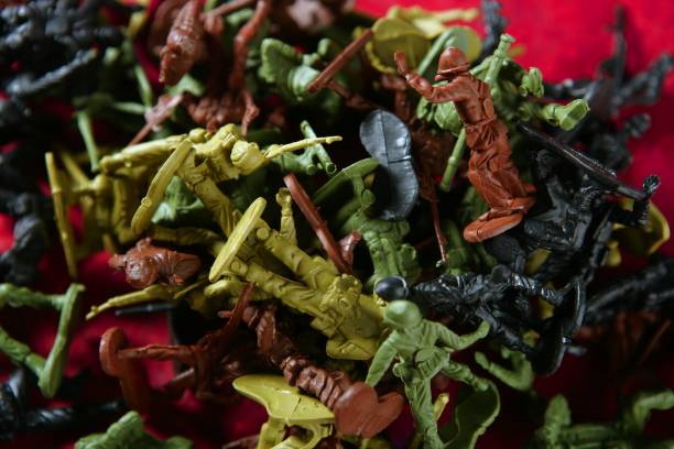 istock Metaphor of dead plastic toy war soldiers 1337223351