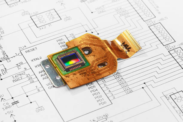 スケマティック図の背景にcmosセンサーを搭載したフレキシブルプリント基板 - sensor ccd electronics industry cmos ストックフォトと画像