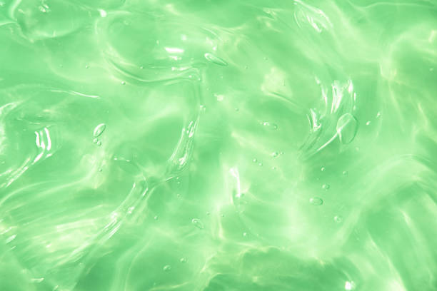 istock Green water Aloe Vera gel smudged texture 1337229823