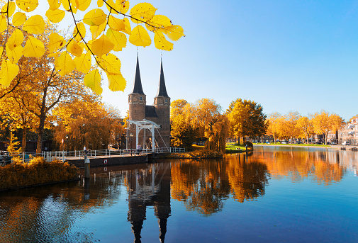 view of Oosrpoort iconic historical gate in Delft, Holland Netherlands at fall day
