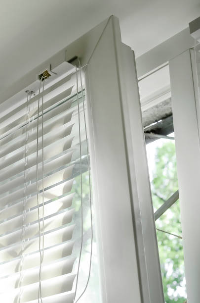 istock Blinds attached to the window, close-up. 1337232570