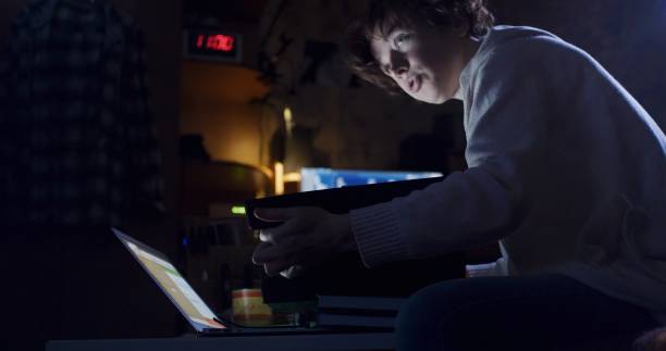 istock Mature woman is working late at home 1337233873