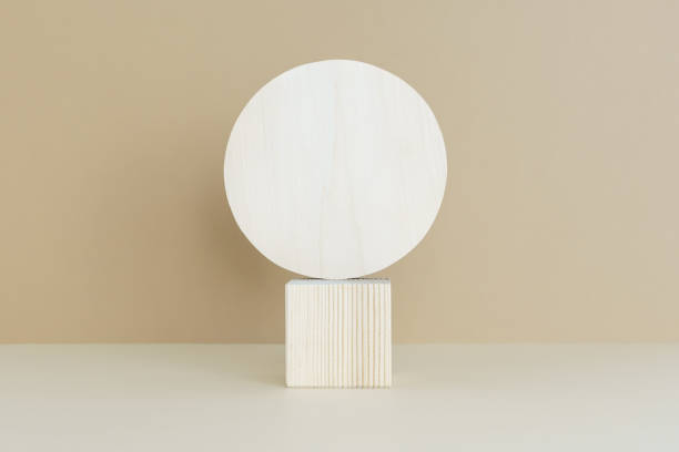 istock A wooden scene on a light table against a beige wall background. Premium podium for advertising your product. 1337235651